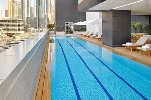 Outdoor pool, open 7:00 AM to 9:00 PM, sun loungers