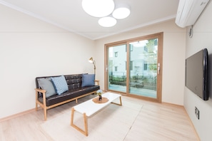 Villa | Living area | Flat-screen TV