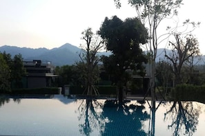 Outdoor pool, pool umbrellas, sun loungers