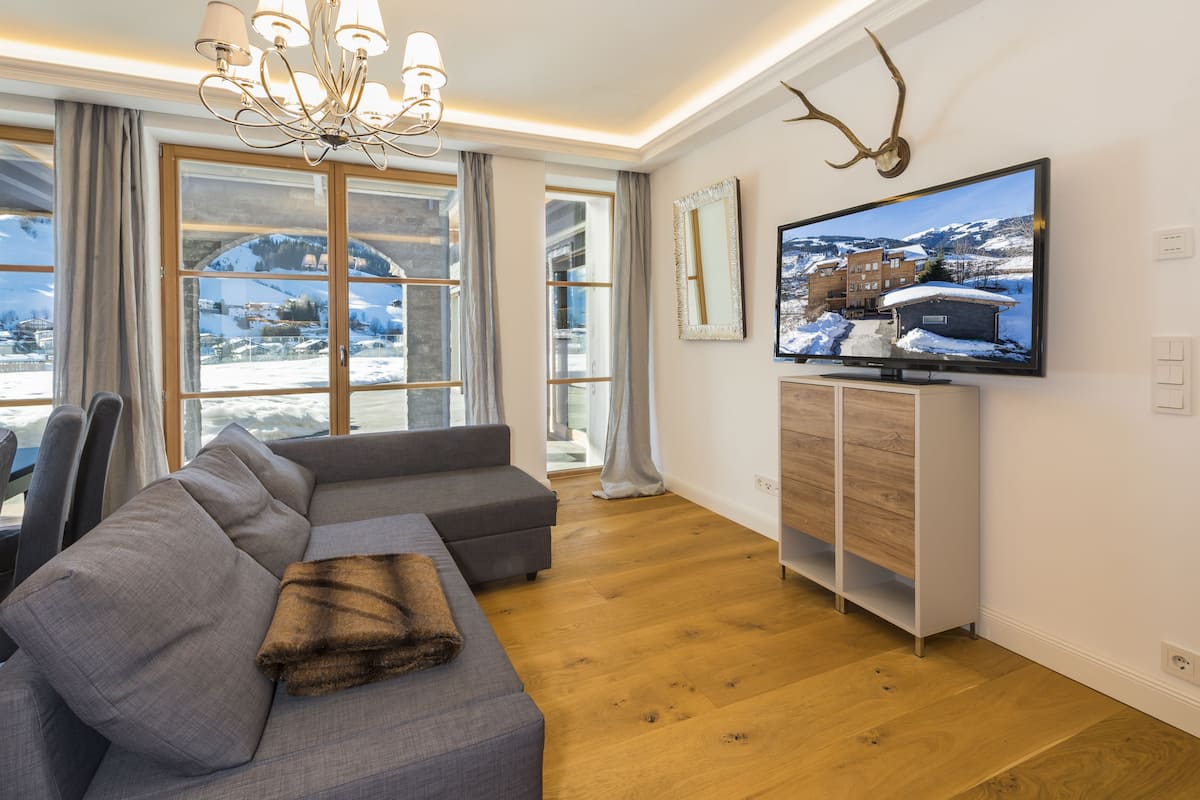 Deluxe Apartment, 2 Bedrooms, Pool Access, Mountain View | Living area | Flat-screen TV, DVD player