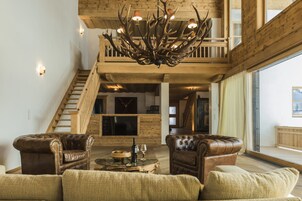 Deluxe Chalet, 5 Bedrooms, Pool Access, Mountain View | Living room | Flat-screen TV, DVD player