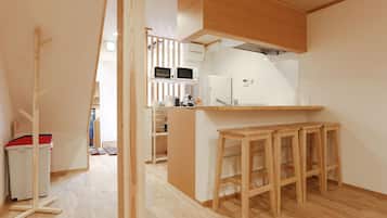 Full-sized fridge, microwave, stovetop, electric kettle