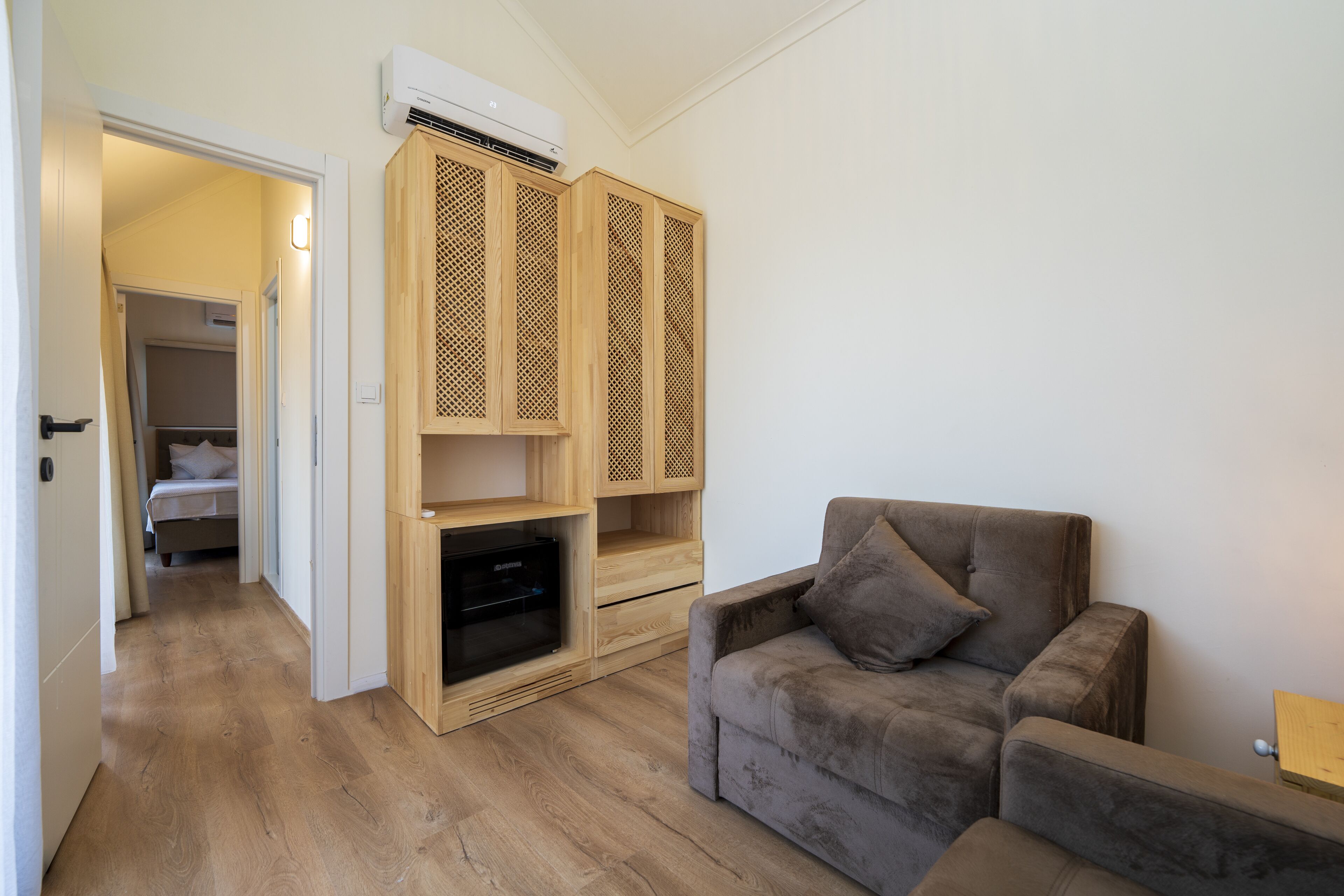 deluxe bungalow | living area | 32-inch led tv with satellite channels, tv