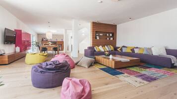 Exclusive Villa, 4 Bedrooms, Sauna, Mountainside | Living area | Flat-screen TV, fireplace