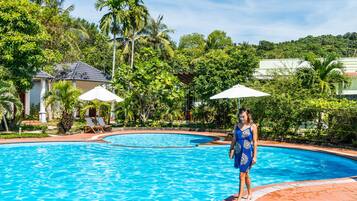 Outdoor pool, pool umbrellas, pool loungers