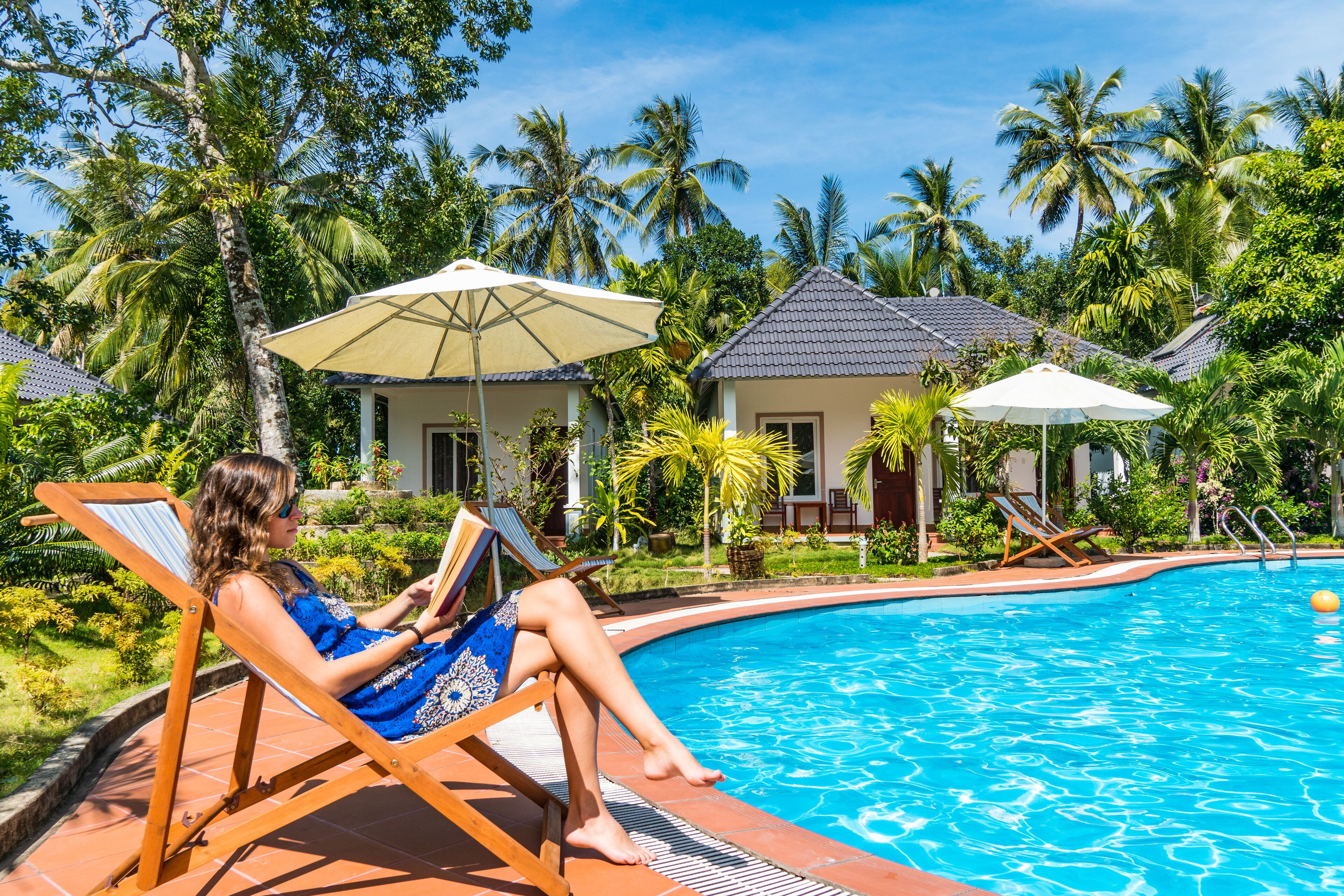 outdoor pool, pool umbrellas, pool loungers