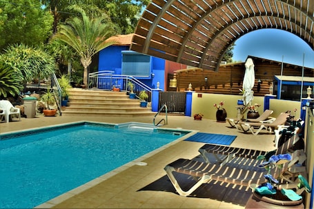 Outdoor pool, sun loungers