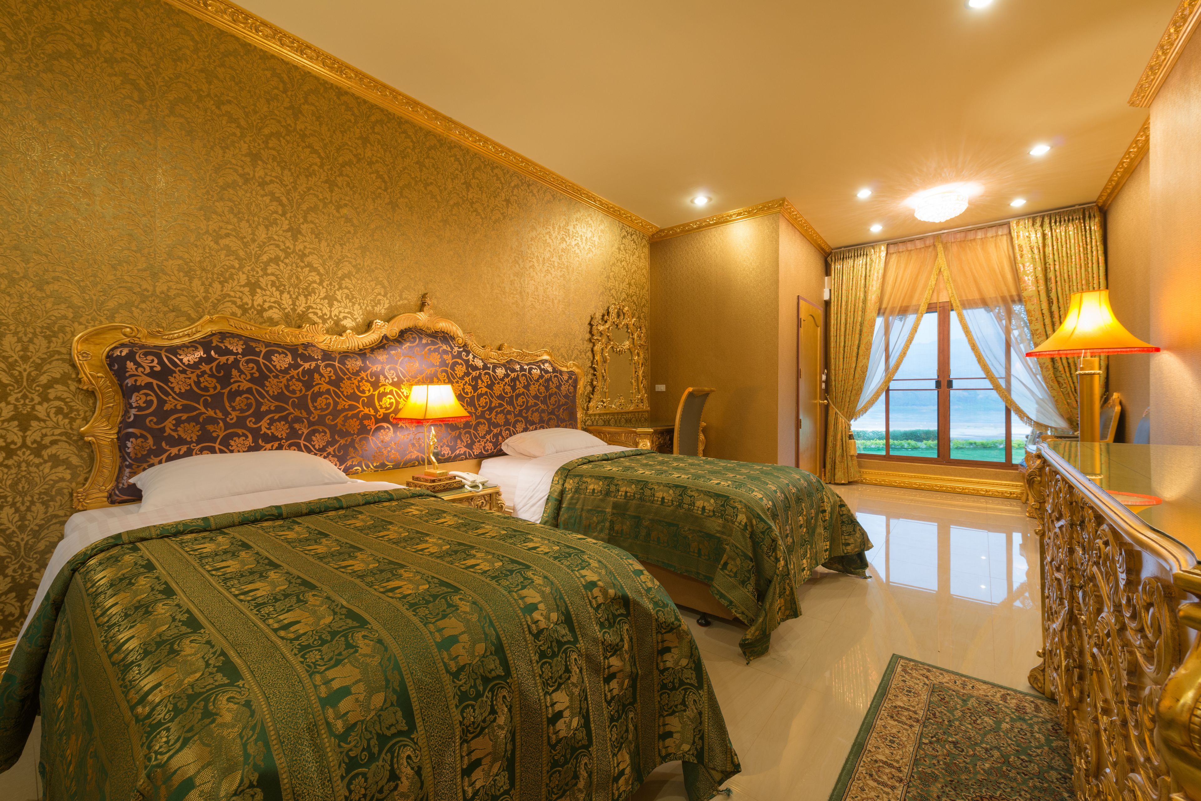 deluxe twin room | minibar, desk, blackout curtains, cots/infant beds