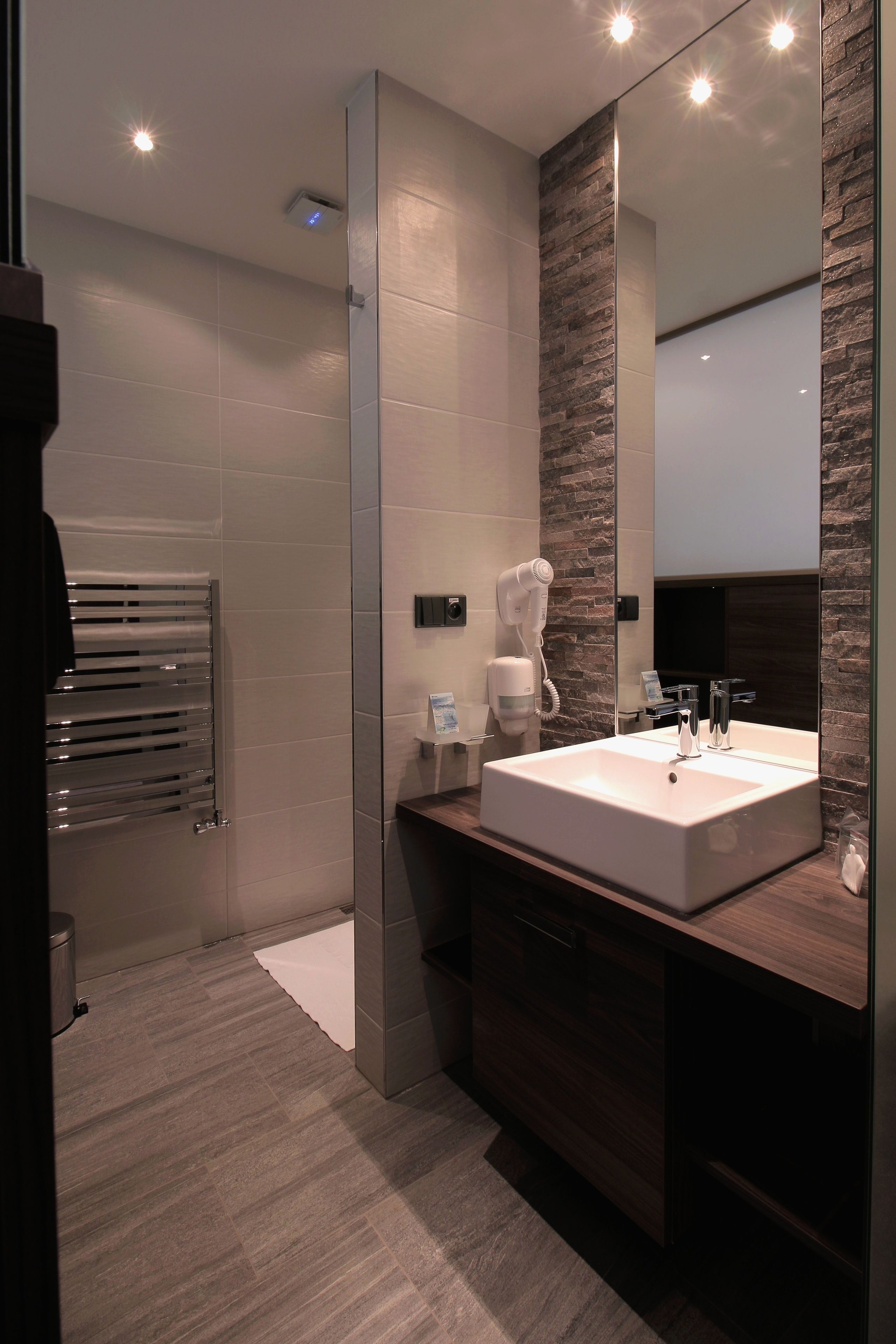 combined shower/bathtub, free toiletries, hair dryer, bathrobes