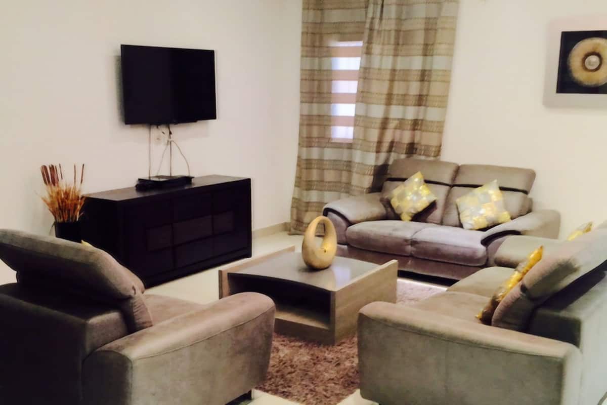 Suite, 1 Bedroom | Living area | Flat-screen TV