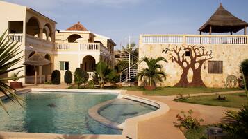 Outdoor pool, pool umbrellas, pool loungers