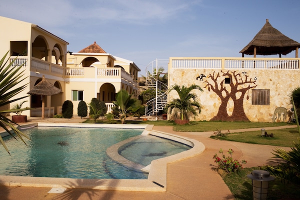 Outdoor pool, pool umbrellas, sun loungers