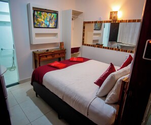 Suite com acessibilidade para mobilidade reduzida | 迷你吧、免费 WiFi、床单