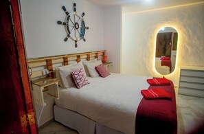 Quarto luxo | Frigobar, Wi-Fi de cortesia, roupa de cama