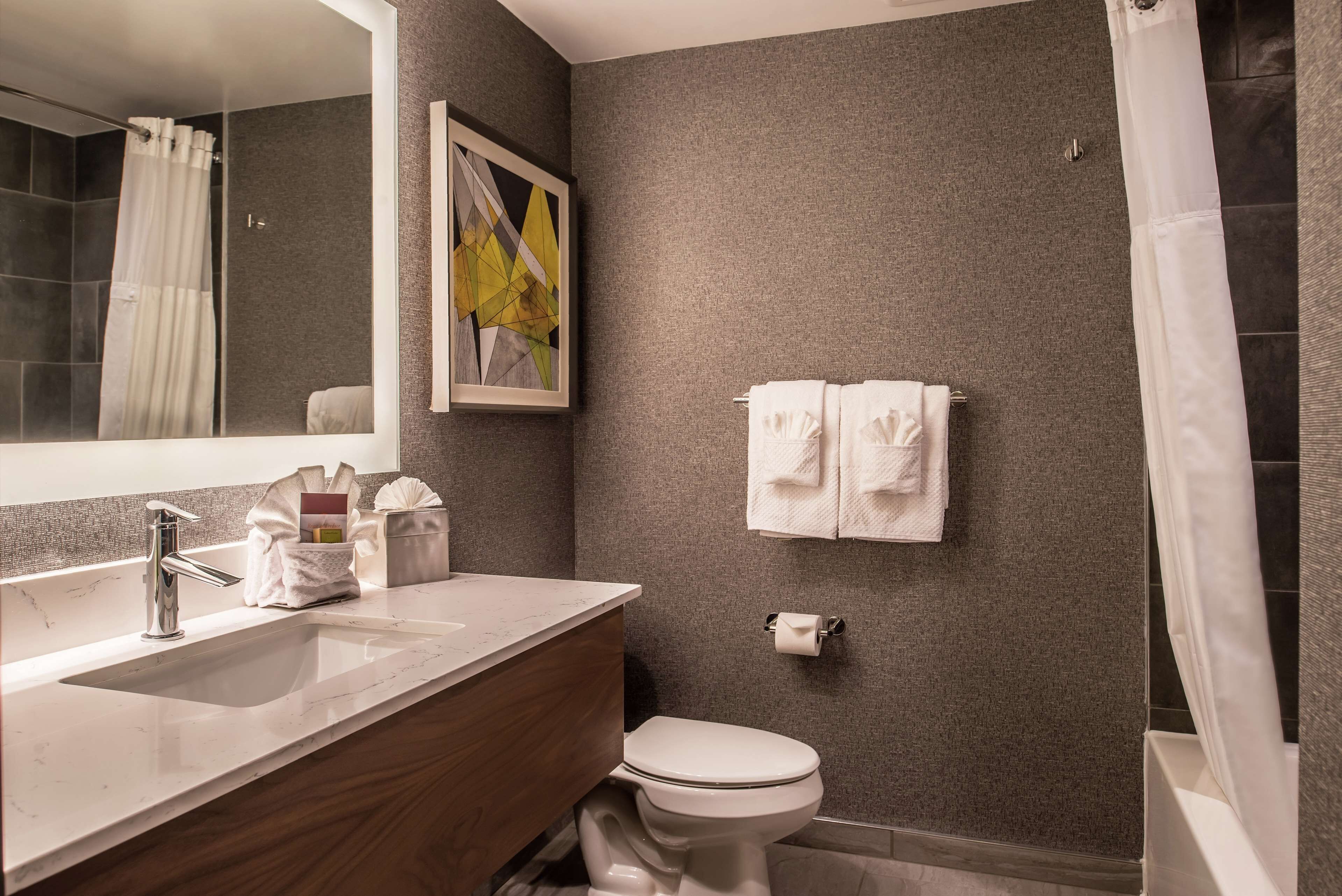 room, 2 queen beds | bathroom | combined shower/bathtub, free toiletries, hair dryer, towels