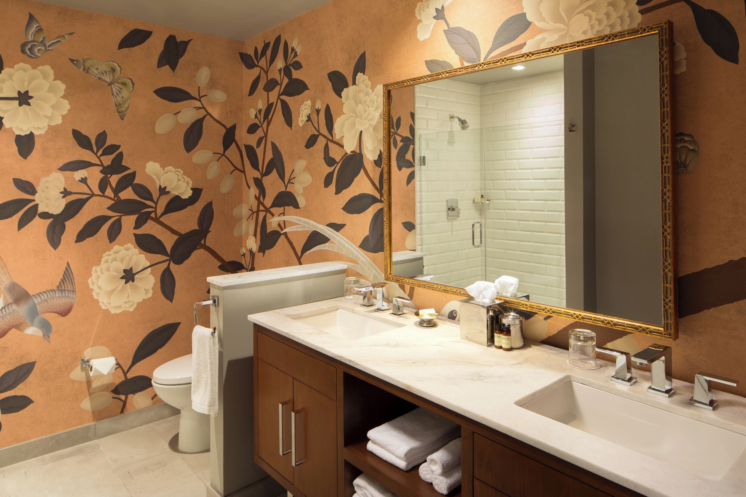 signature suite | bathroom | shower, designer toiletries, hair dryer, bathrobes