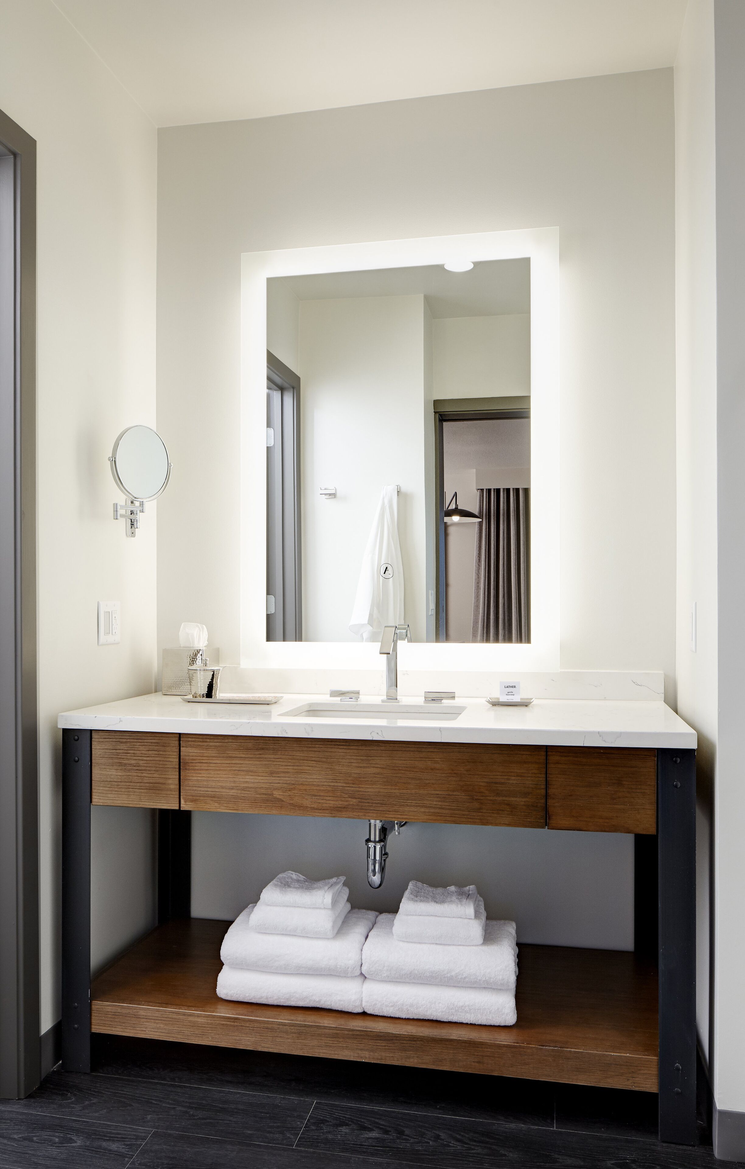 designer toiletries, hair dryer, bathrobes, slippers