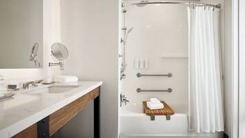 Designer toiletries, hair dryer, bathrobes, slippers