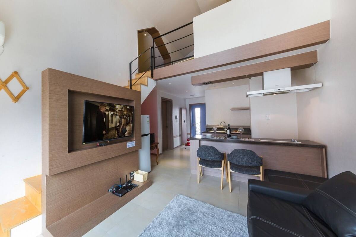 Forte, Duplex, Jetted Tub | Wohnbereich | Flachbildfernseher