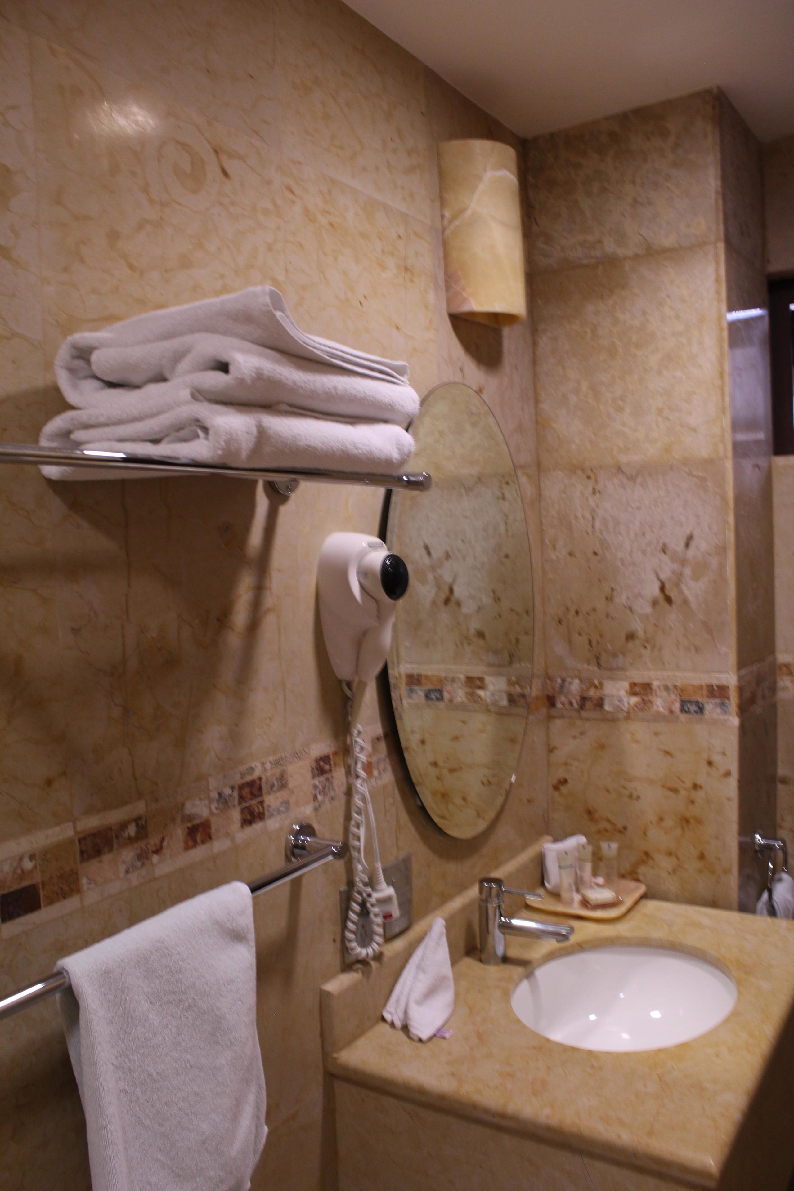 superior duplex, 1 king bed, private bathroom | bathroom | shower, designer toiletries, hair dryer, towels