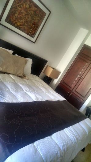 Premium bedding, down duvets, in-room safe, desk