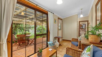 Cottage, 2 Bedrooms | Living area | Flat-screen TV, DVD player