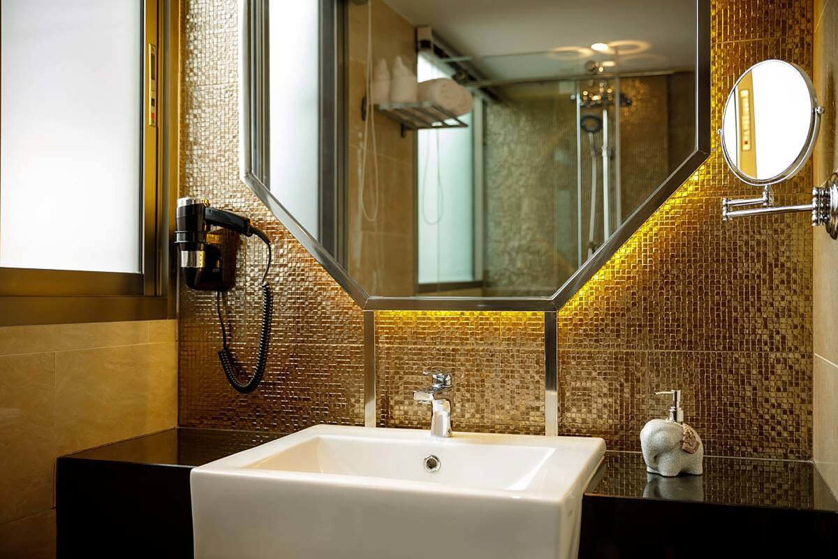 luxury suite, 1 king bed | bathroom | free toiletries, hair dryer, bathrobes, slippers