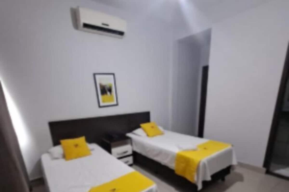 Twin Room | Iron/ironing board (on request), WiFi (free)