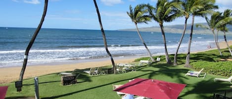 On the beach, sun loungers, beach towels