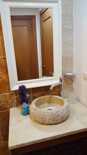 Shower, hair dryer, towels, toilet paper