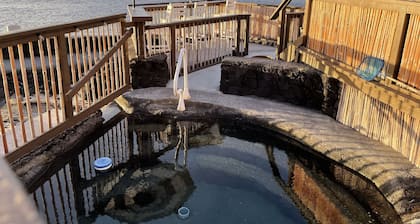 RELAXING, Away-from-it-All home on the water with small Natural Pool
