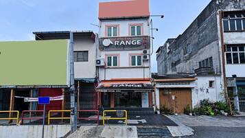 Hotel Range features a two-story building with a flat roof and a welcoming entrance via stairs.