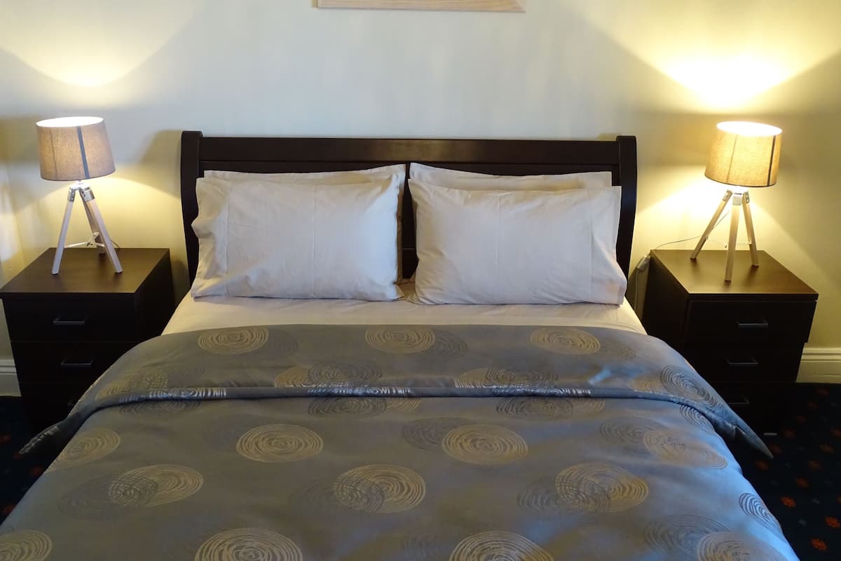 queen room | iron/ironing board, bed sheets