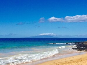 On the beach, sun-loungers, beach towels