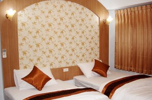 Twin Bed | Minibar, una scrivania, tende oscuranti, Wi-Fi gratuito