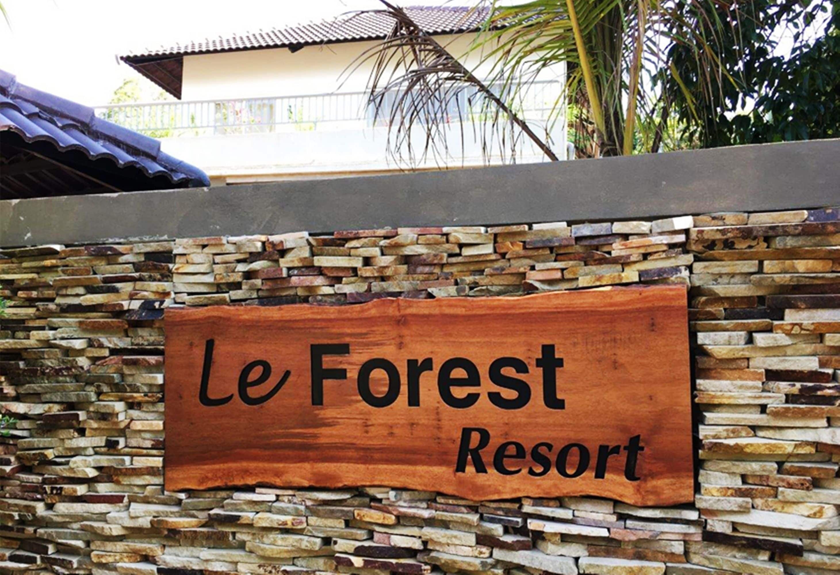 A sign for Le Forest Resort.