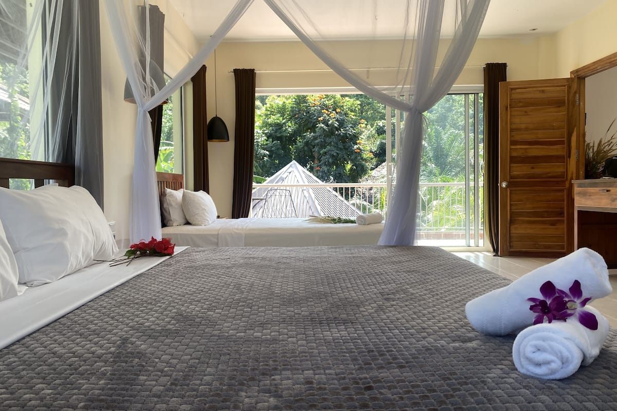 premium suite, 1 bedroom, pool view | minibar, in-room safe, desk, blackout curtains