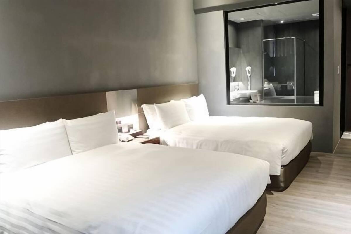 Premium bedding, down comforters, pillowtop beds, minibar
