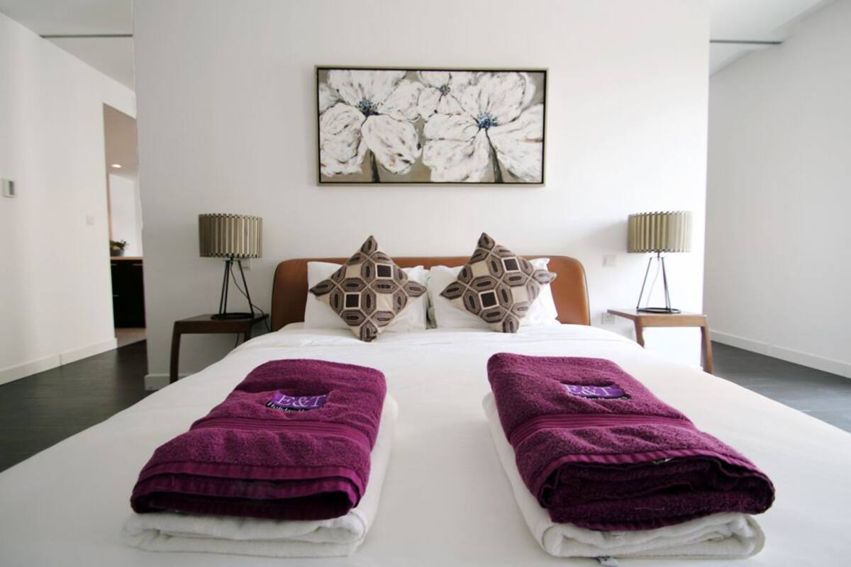 Apartment, 1 Bedroom | 1 bedroom, in-room safe, blackout curtains, iron/ironing board