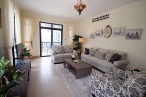 Apartment, 2 Bedrooms | Living room | TV - Kennedy Towers - Zanzebeel 3 (Dubai)