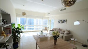 Apartment, 1 Bedroom | Living area | TV - Kennedy Towers - Al Sahab (Dubai)