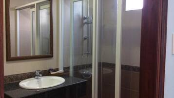 Shower, free toiletries, hair dryer, slippers