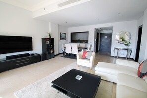 Apartment, 1 Bedroom | Living area | Flat-screen TV