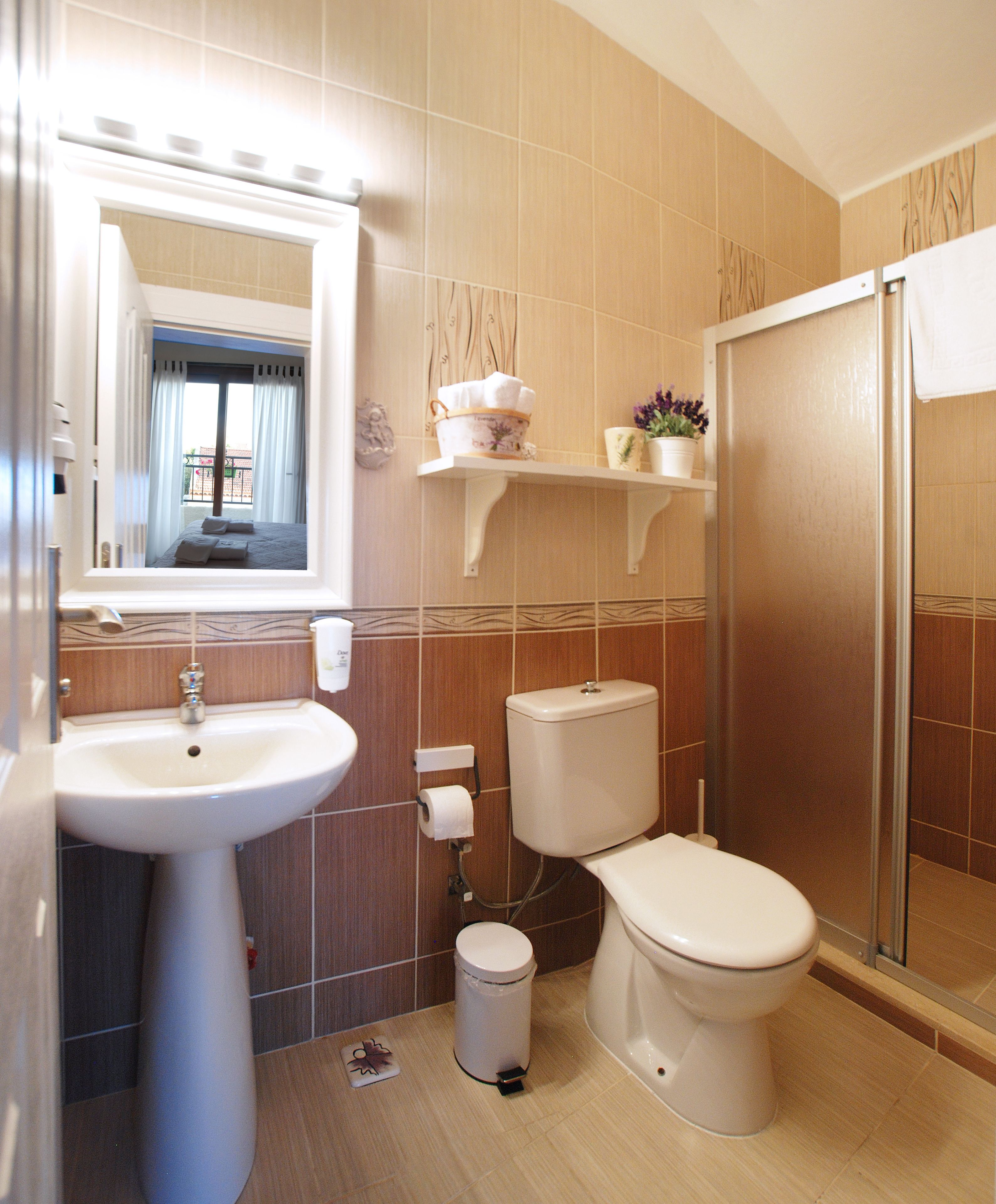 shower, free toiletries, hair dryer, slippers