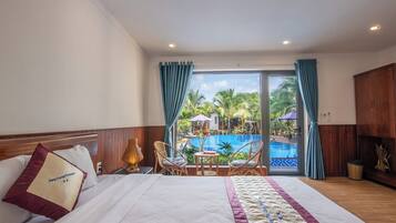 Deluxe Double Room, Pool View | Minibar, desk, soundproofing, free WiFi