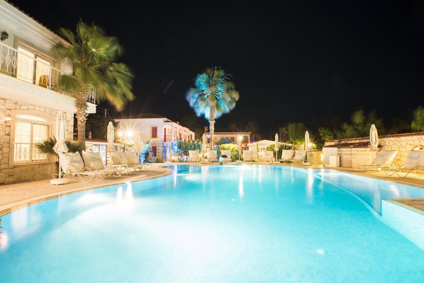 outdoor pool, pool umbrellas, pool loungers