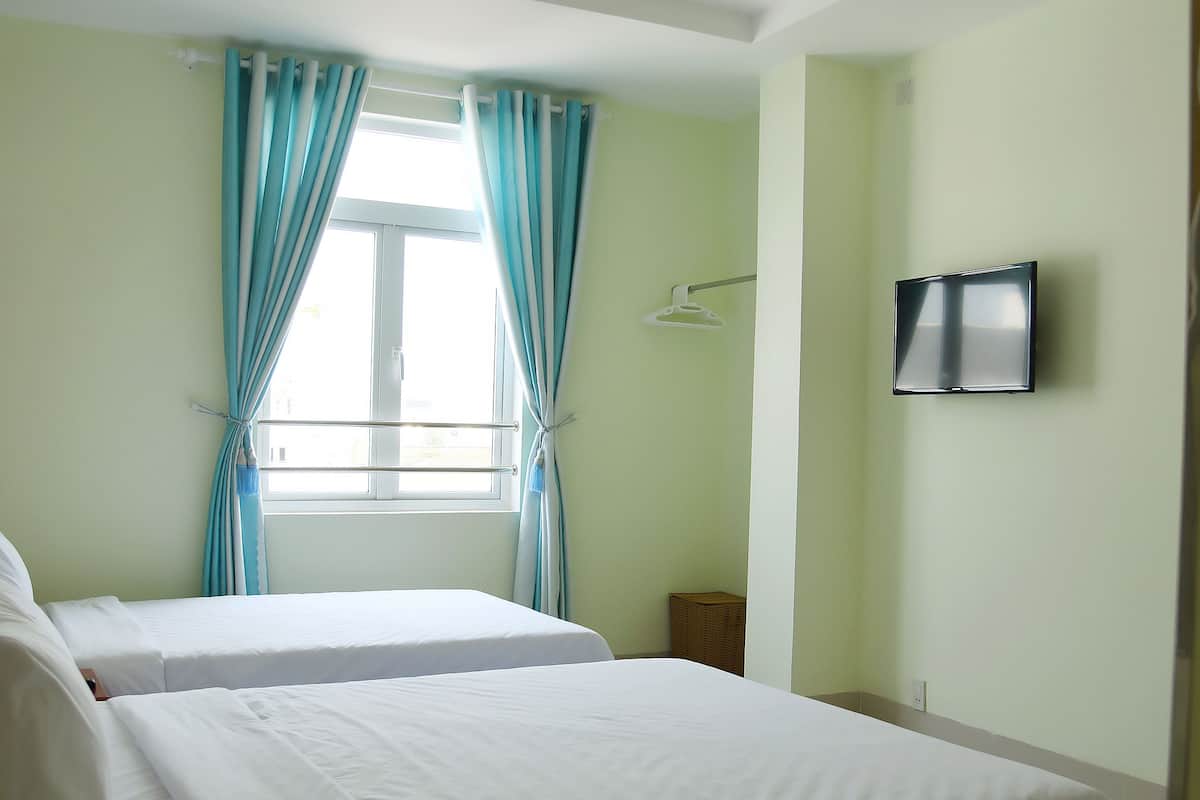 Chambre Triple Supérieure | Minibar, bureau, Wi-Fi gratuit