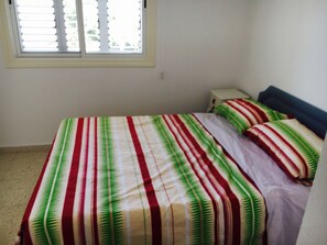 Design Townhome, 2 Bedrooms, Kitchen, Sea View | 2 bedrooms, desk, blackout curtains, iron/ironing board