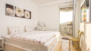 Apartment, 1 Bedroom, Terrace | 1 bedroom, individually decorated, individually furnished, desk