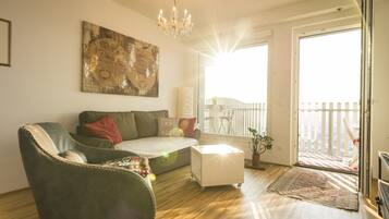 Apartment, 1 Bedroom, Terrace | Living area | Flat-screen TV